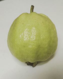 Close-up of apple against white background