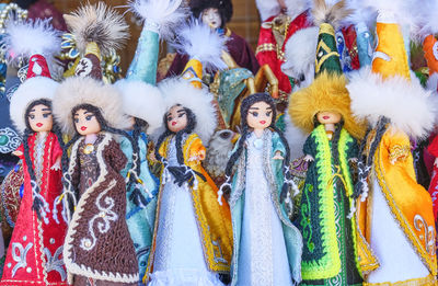Kazakh small dolls in traditional national clothes.souvenir shop at local market, almaty,kazakhstan