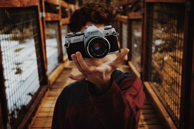 Portrait of man photographing