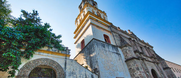 Low angle view of traditional building against sky