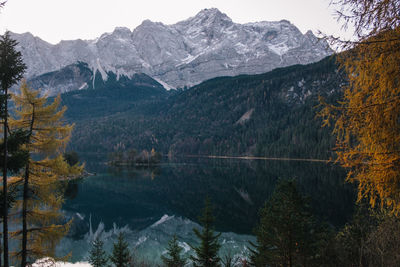 Scenic view of lake and mountains during autumn