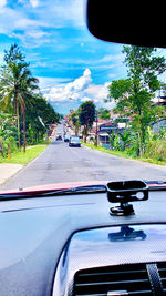 Road seen through car windshield