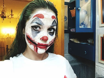 Portrait of man wearing sunglasses at home