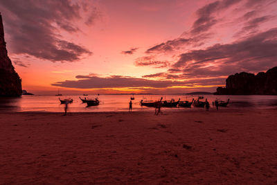 Scenic view of beach against sky during sunset