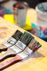 High angle view of paintbrushes on table