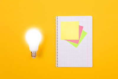 Close-up of illuminated light bulb