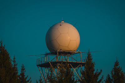 Low angle view of tower against clear blue sky