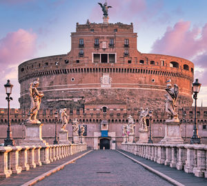 Statue of historic building against sky