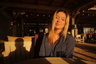 Woman looking away at restaurant