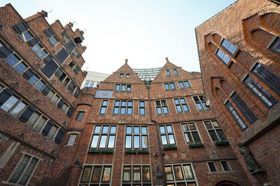 Low angle view of buildings against sky