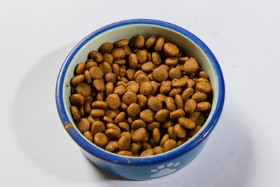 High angle view of coffee beans in bowl