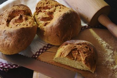 High angle view of bread on cutting board