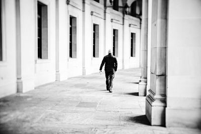 Full length of man walking in city