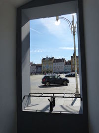 City street seen through glass window