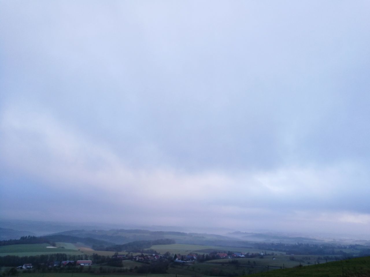 AERIAL VIEW OF CITY AGAINST SKY