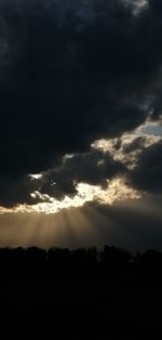 Low angle view of cloudy sky during sunset