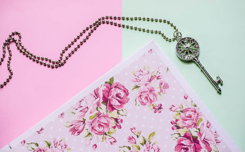 Close-up of pink flower on table