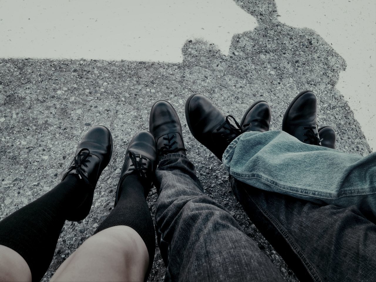 low section, person, shoe, personal perspective, lifestyles, men, leisure activity, togetherness, standing, human foot, footwear, jeans, high angle view, casual clothing, bonding