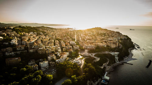 High angle view of buildings in city against sky
