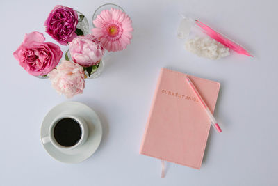 Pink flowers on table