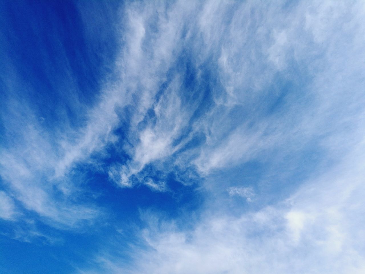 blue, sky, low angle view, cirrus, backgrounds, no people, cloud - sky, nature, day, outdoors, beauty in nature, sky only, vapor trail, object, contrail