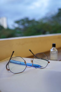 Close-up of eyeglasses on table