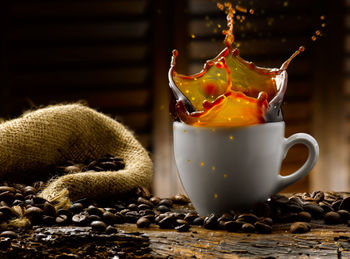 Close-up of coffee cup on table