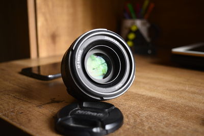 Close-up of camera on table
