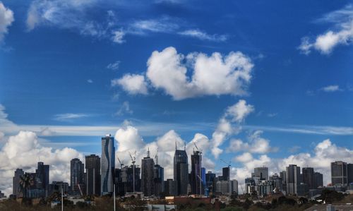 Modern cityscape against sky