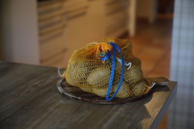 Close-up of wicker basket on table