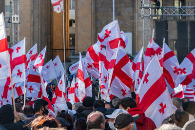 Group of people protesting on street