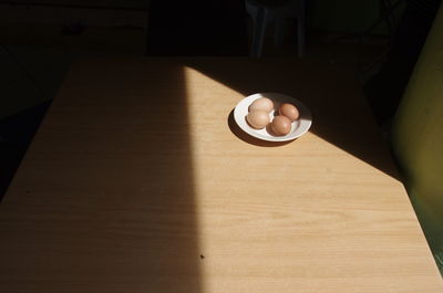 High angle view of electric lamp on table