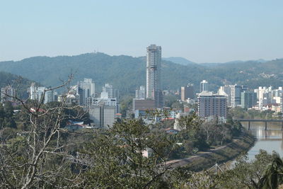 View of cityscape against clear sky