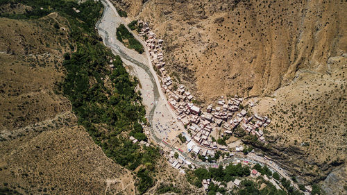 High angle view of field with mountain in background