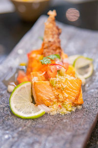 Close-up of fish in plate on table