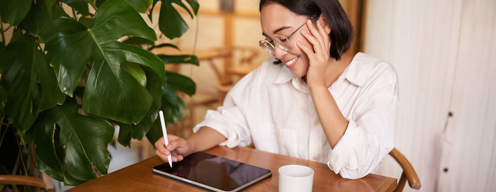 Young woman using mobile phone