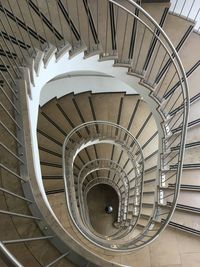 Directly above shot of spiral staircase in building