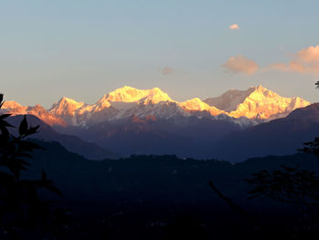 Scenic view of mountains against sky during sunset