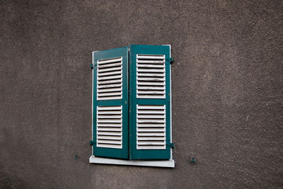 Directly above shot of window on wall of building