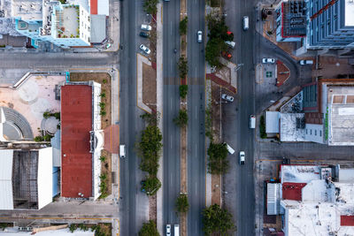 Busy street with small buildings near the beach area of cancun