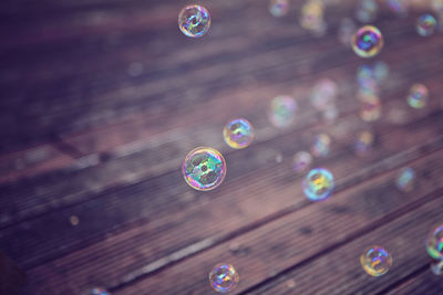 High angle view of bubbles in mid-air