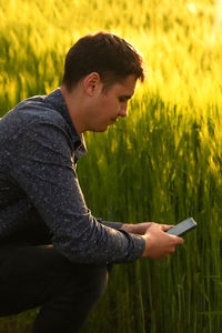 Young man using mobile phone