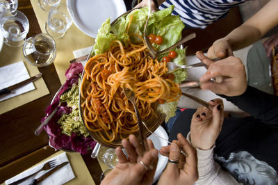 Midsection of woman preparing food