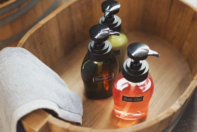 High angle view of bottles on table