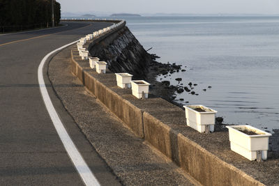 High angle view of the seaside road against sky