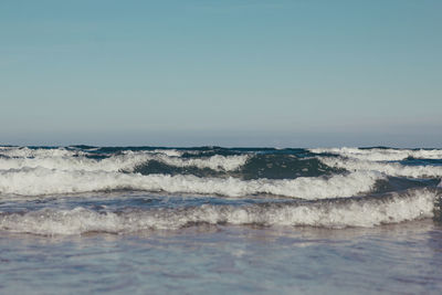 Scenic view of sea against clear sky