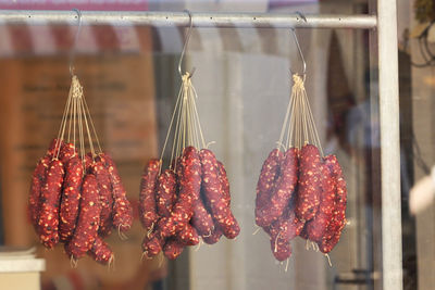 Close-up of meat hanging for sale in market