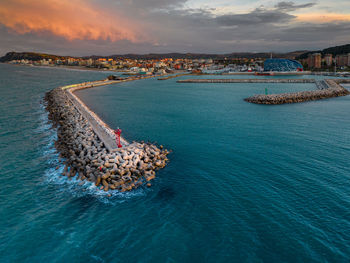 High angle view of sea against sky during sunset