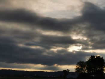 Low angle view of dramatic sky during sunset