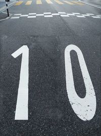 High angle view of number 10 on road in city